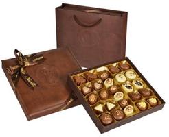 Bolci Шоколадови бонбони асорти в кутия от естествена кожа 330 гр